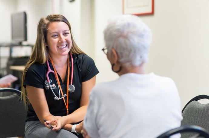 a student working with a patient